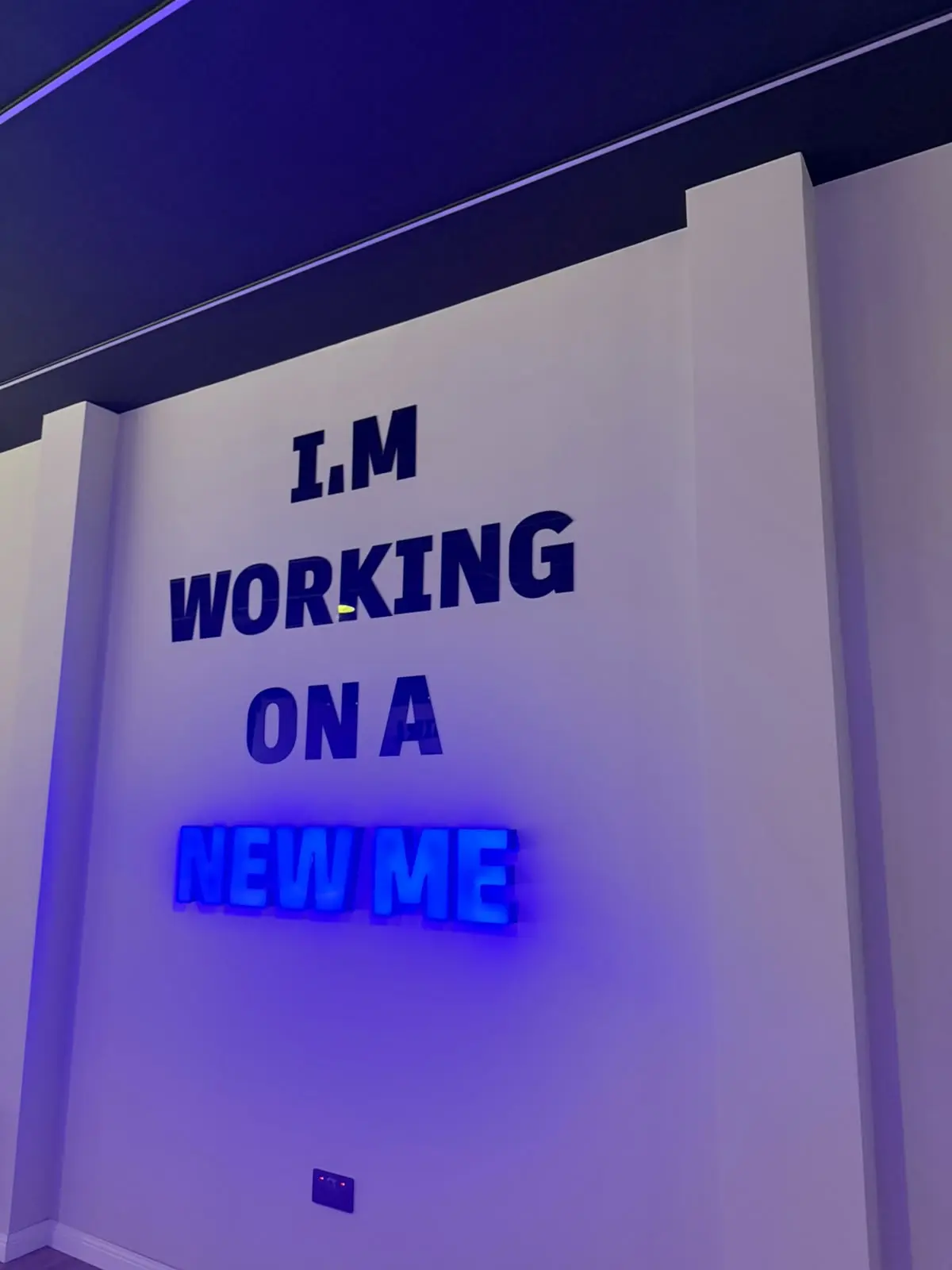 Motivational feature wall inside the group classes studio